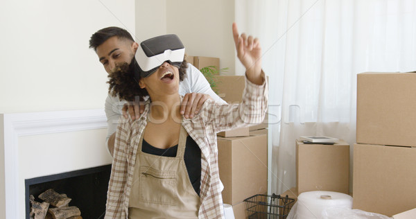 Happy young couple doing Virtual tour in new apartment Stock photo © dash