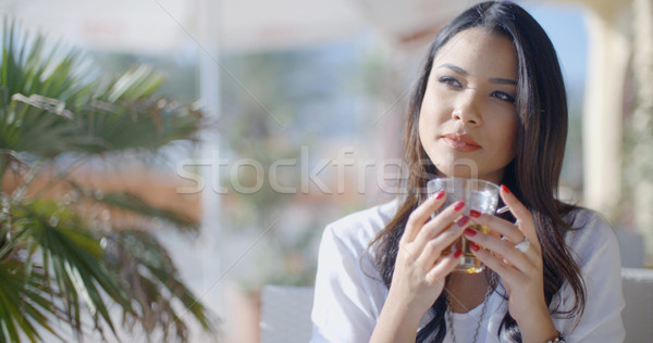 Girl Sitting At Cafe With Cup Of Tea Stock photo © dash