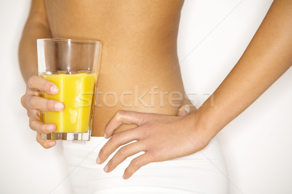 Młodych piękna kobieta szkła sok pomarańczowy dziewczyna Zdjęcia stock © dash