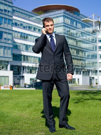 Geschäftsmann fordern Telefon außerhalb Gebäude jungen Stock foto © dash