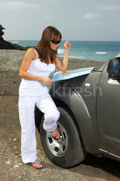 Dziewczyna samochodu kobieta chmury morza podróży Zdjęcia stock © dash