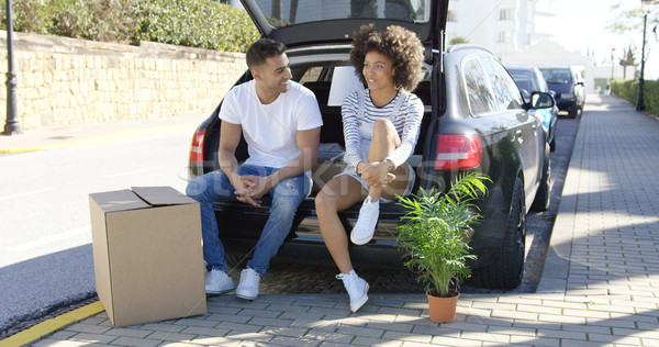 Young couple relaxing while moving house Stock photo © dash