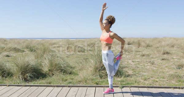 Woman stretching a leg Stock photo © dash
