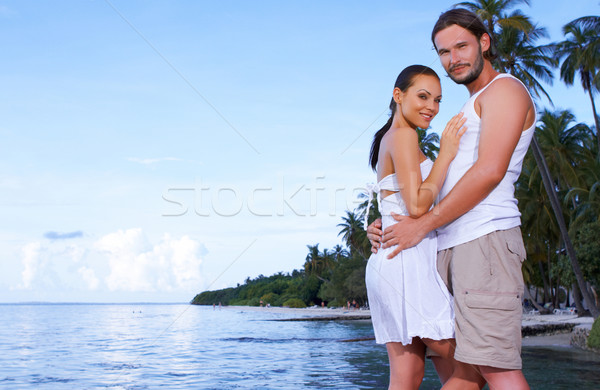 Stockfoto: Paar · palmboom · romantische · permanente · vrouw · water