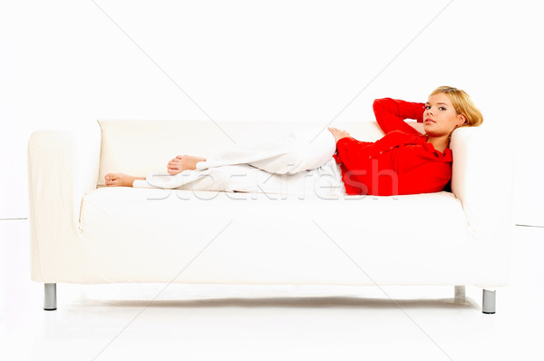 женщины диване молодые довольно расслабляющая женщину Сток-фото © dash
