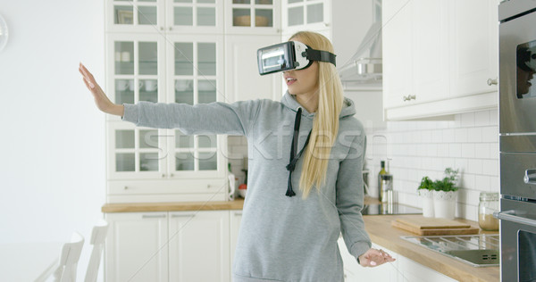 Woman enjoying VR headset Stock photo © dash