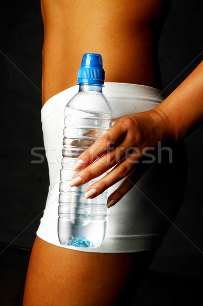 Mujer de la aptitud botella agua nina cuerpo Foto stock © dash