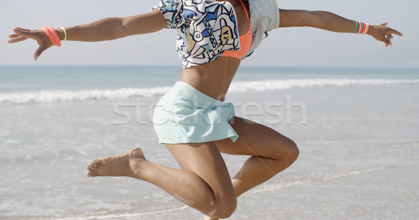 Woman Dancing Against The Sea Stock photo © dash
