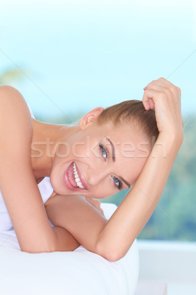 Beautiful high-spirited woman laughing Stock photo © dash