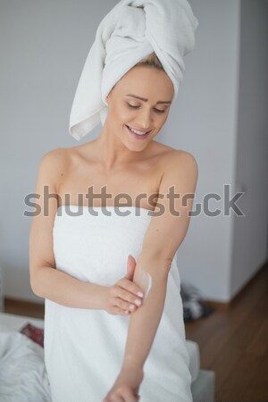 Smiling Woman Wearing White Bath Towel Stock photo © dash
