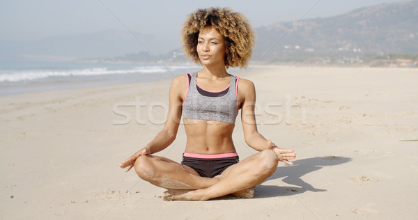 Meditál tenger part lány ül jóga Stock fotó © dash