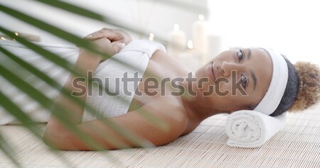 Woman Lying On A Lounger In Wellness Center Stock photo © dash