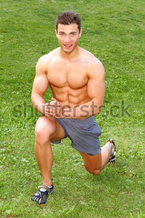 Handsome man doing exercises Stock photo © dash