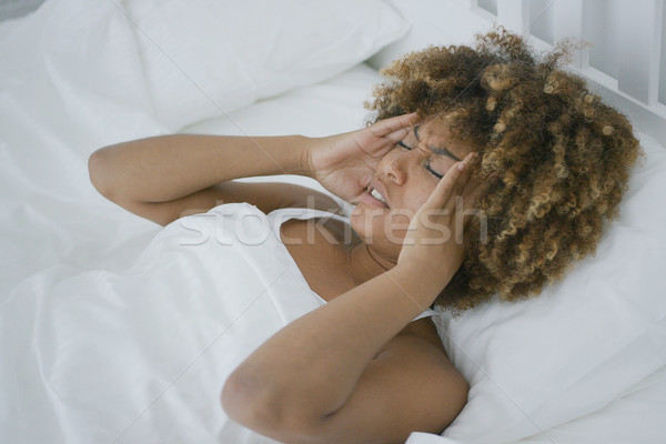 Young woman having head pain Stock photo © dash