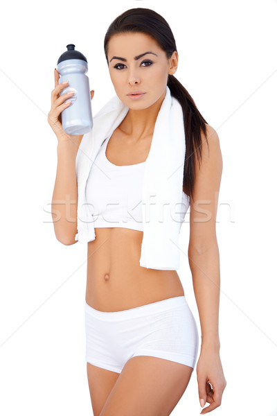 Brunetka kobieta manierka sportowe nosić Zdjęcia stock © dash