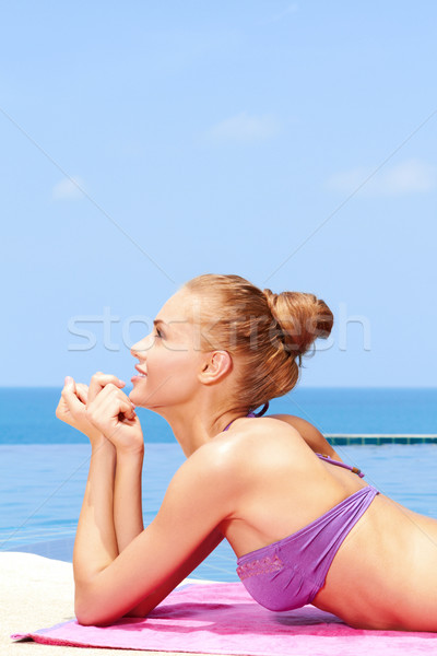 Toma bikini rubio piscina Foto stock © dash