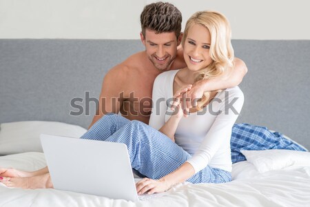 Sexy boy and girl on bed
