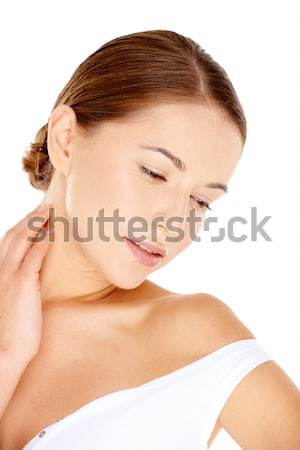 Gyönyörű kecses fiatal nő kéz nyak lefelé néz Stock fotó © dash