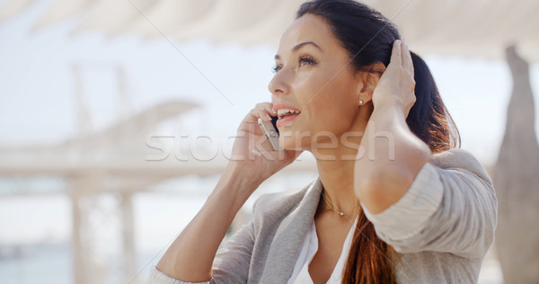 Woman using a mobile in a high key environment Stock photo © dash