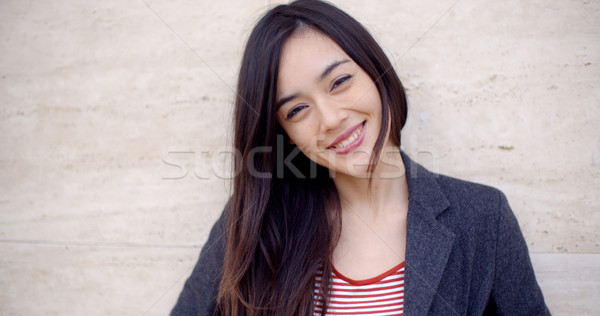 Gorgeous young woman with a vivacious smile Stock photo © dash