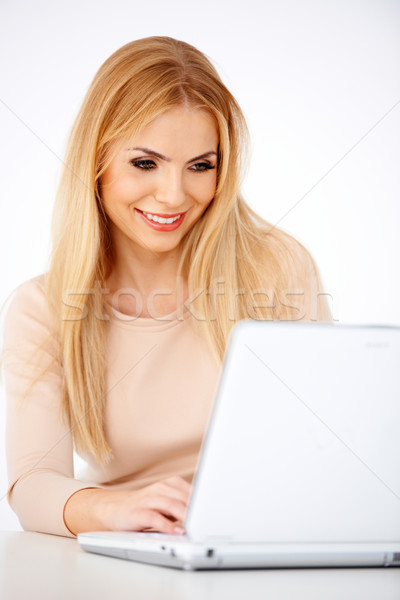 Feliz mujer rubia de trabajo portátil escritorio nina Foto stock © dash