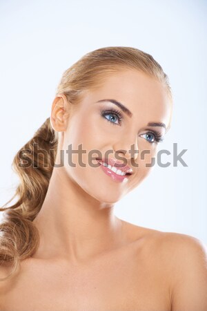 Beautiful young woman looking surprised Stock photo © dash