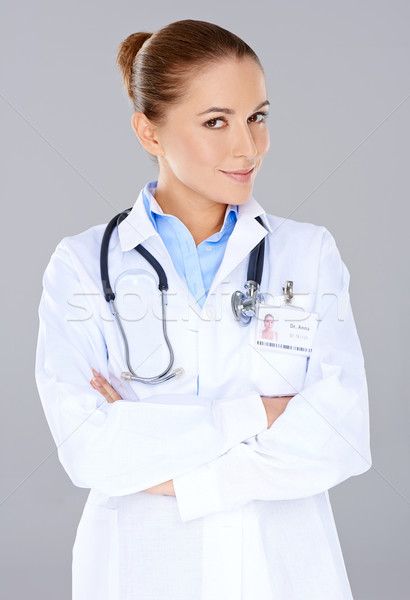 Confident female doctor with crossed arms Stock photo © dash
