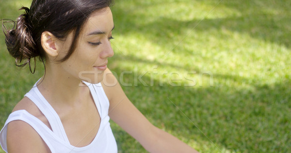 Serein jeune femme méditer vert pelouse [[stock_photo]] © dash