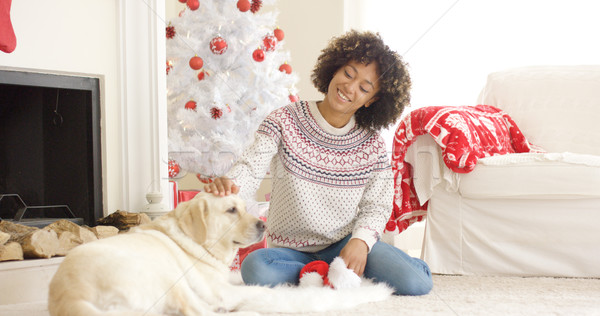 Pretty young woman stroking her dog Stock photo © dash
