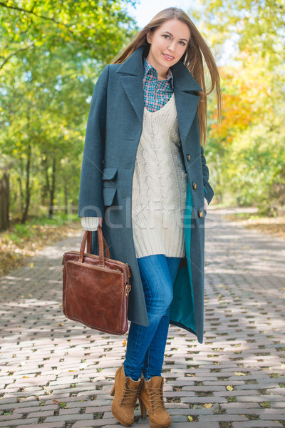 Fiatal nő őszi idény viselet ösvény csinos tart Stock fotó © dash