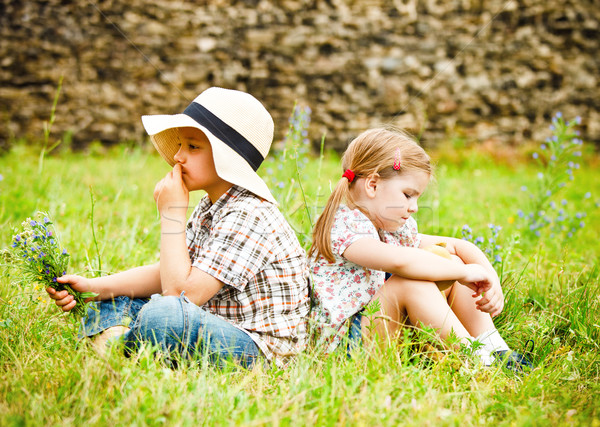 Little boy and little girl near the country house Stock photo © dashapetrenko