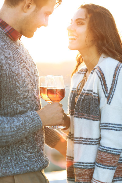 Man and woman with wineglasses outdoors Stock photo © dashapetrenko