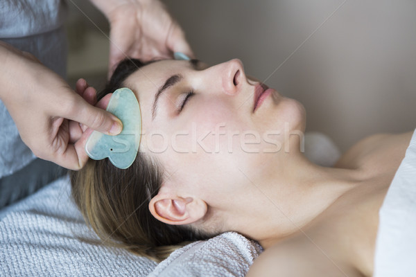 Young woman have face treatment at beauty clinic Stock photo © dashapetrenko