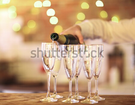 Deux champagne verres table restaurant table en bois [[stock_photo]] © dashapetrenko