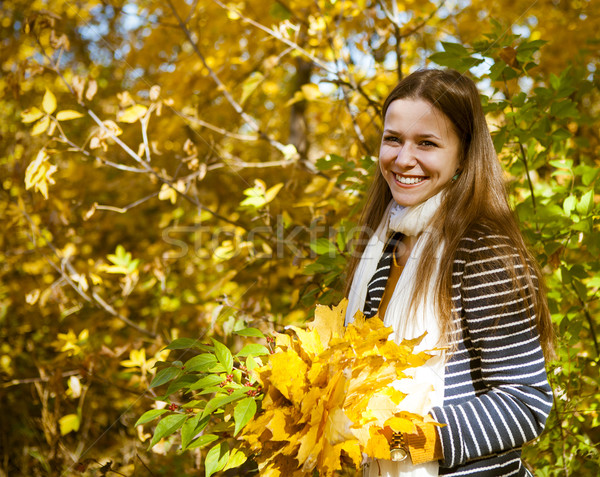 Portrait of a beautiful teenage girl having fun in autumn park Stock photo © dashapetrenko