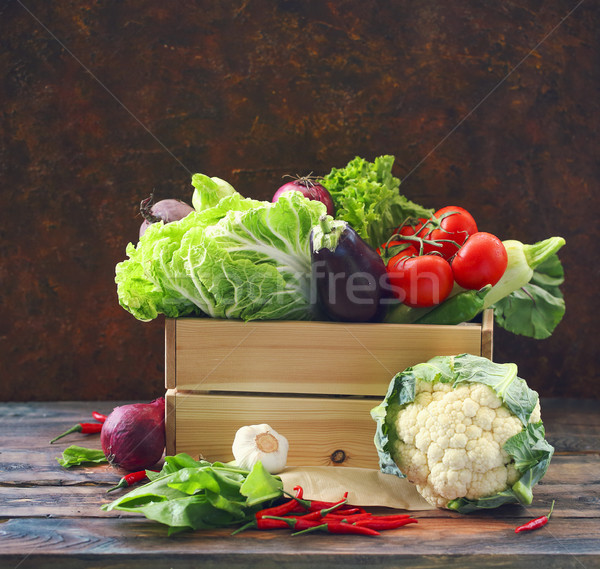 Organic raw vegitables in wooden box. Healthy diet and nutrition Stock photo © dashapetrenko
