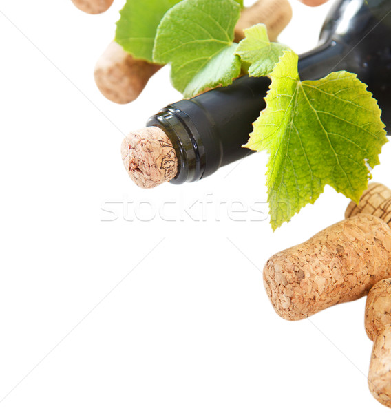 Stock photo: Bottle corks and bottle on the white background 