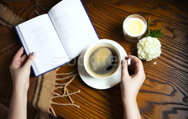 Coffee, book, plaid and candle at home. Food, hygge and comfort  Stock photo © dashapetrenko