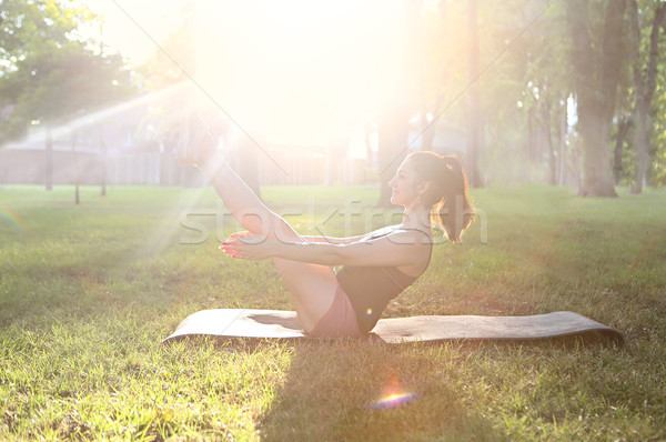 Stretching woman in outdoor exercise smiling happy doing stretch Stock photo © dashapetrenko