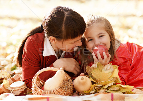 Mother with daughter on autumn picnic Stock photo © dashapetrenko