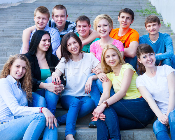 Group of smiling teenagers outdoors Stock photo © dashapetrenko