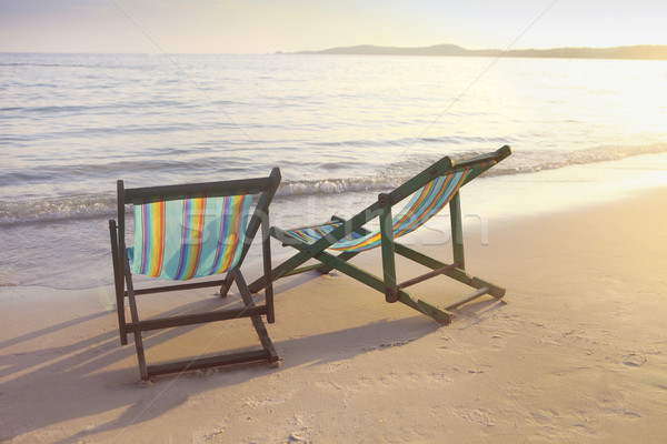 Two sun chairs on the beach  Stock photo © dashapetrenko