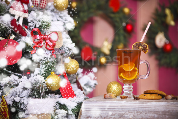 Hot winter tea with spices on a rustic table  Stock photo © dashapetrenko