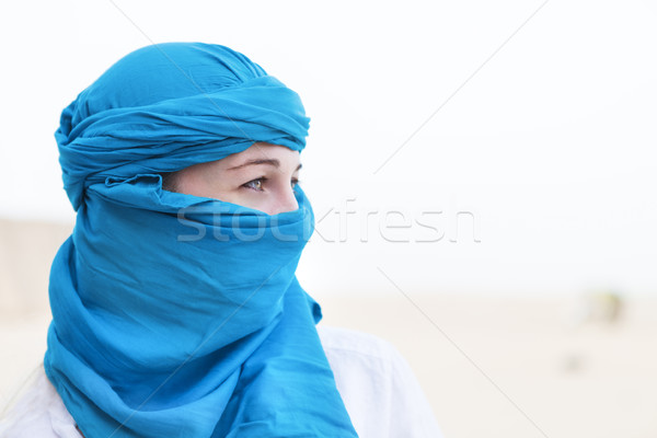 Beautiful arabic woman face posing on sunset background Stock photo © dashapetrenko