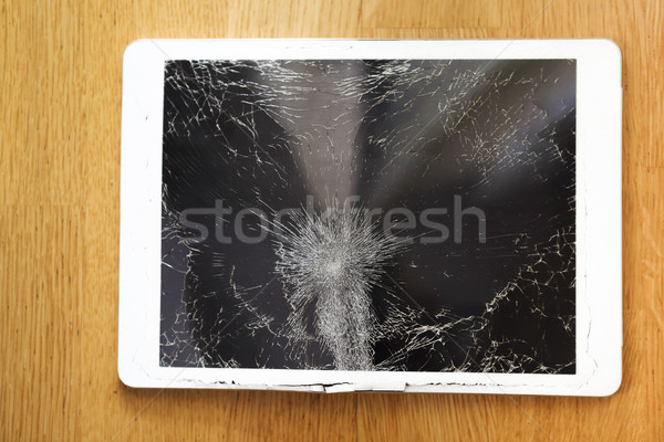 Damaged tablet computer lcd display on the floor Stock photo © dashapetrenko