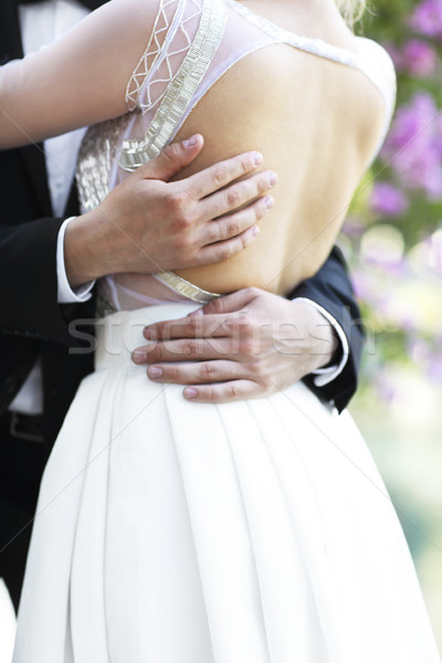 Young bride and groom outdoors Stock photo © dashapetrenko