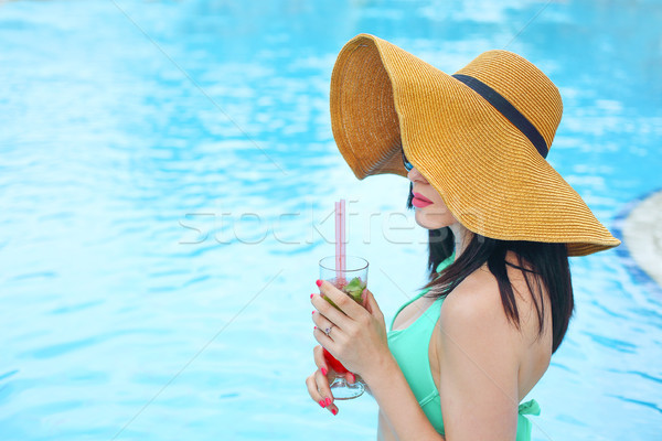 Young woman with glass of lemonade Stock photo © dashapetrenko