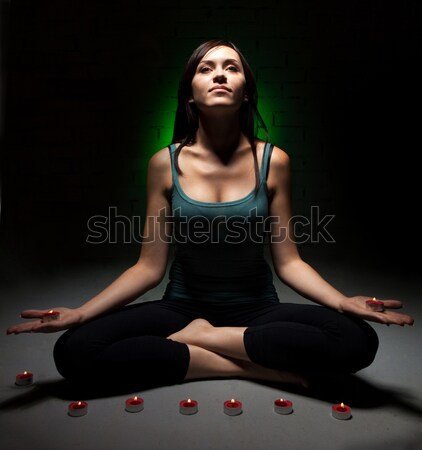 Stock photo: Attractive young woman doing yoga