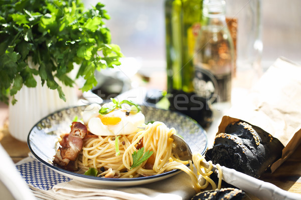 Spaghetti carbonaraby the window with arty garnish Stock photo © dashapetrenko