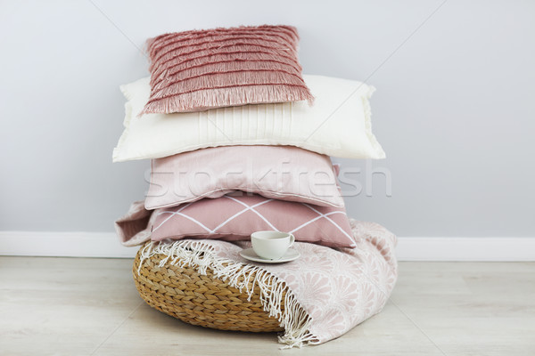 Pink and white pillows on the wall background. Close up Stock photo © dashapetrenko